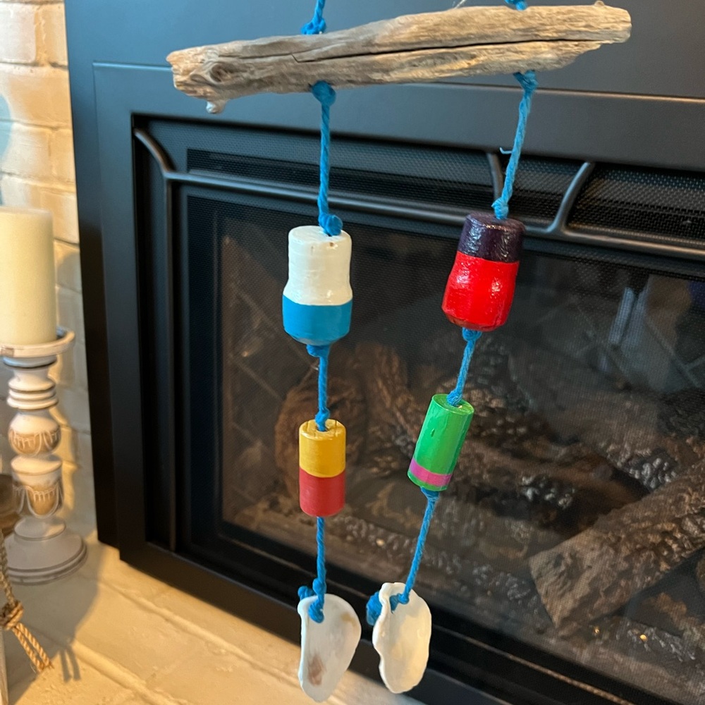 Handmade hanging driftweod and shell piece